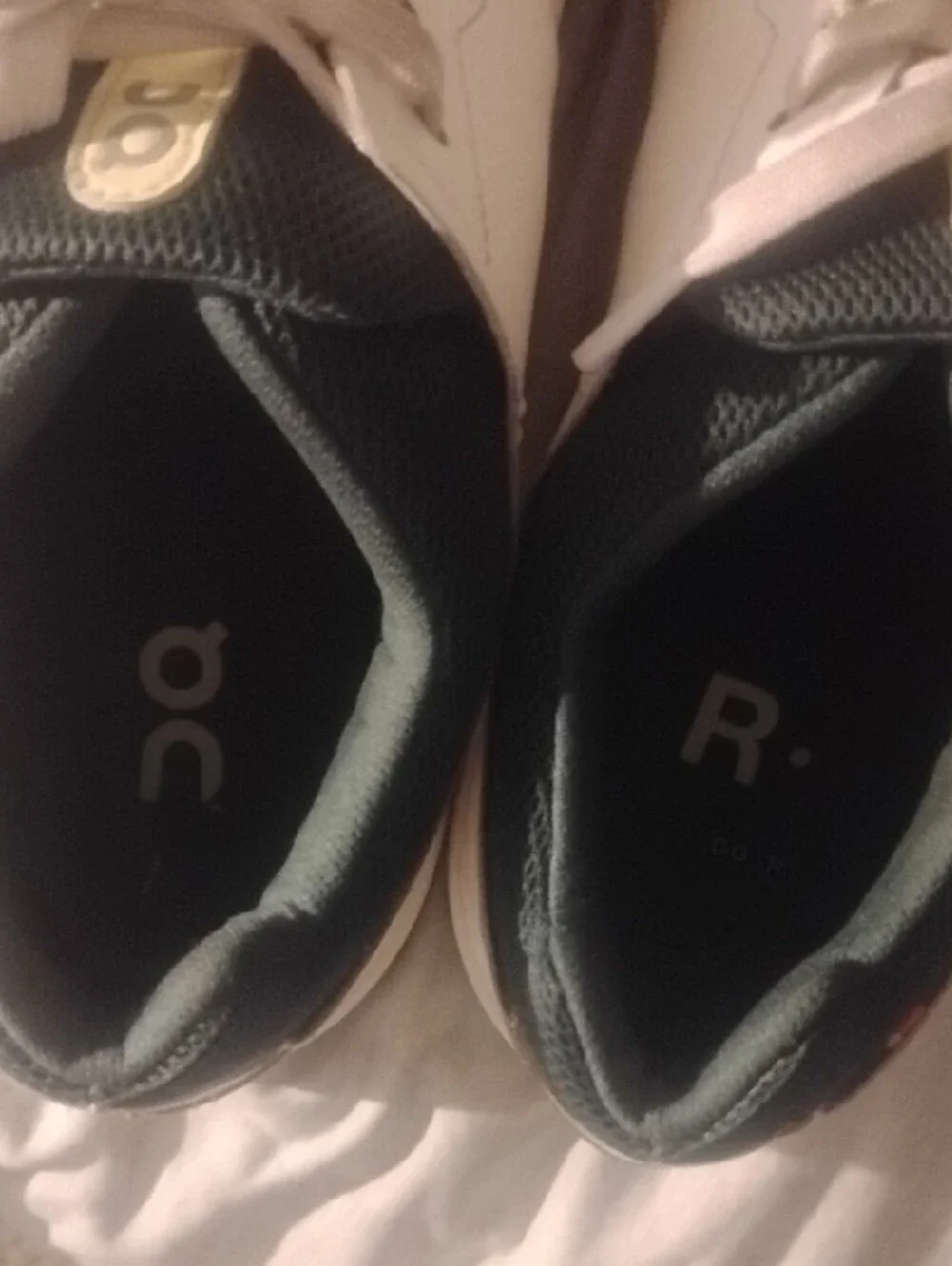On Running The Roger Navy And White With Yellow Accents Size 11.5